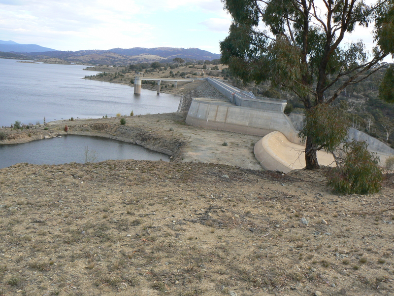 The eroded spillway and the dam wall