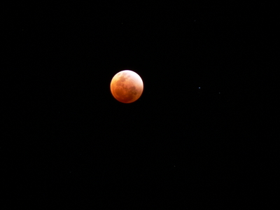 The full lunar eclipse with ample camera settings at 7:55PM