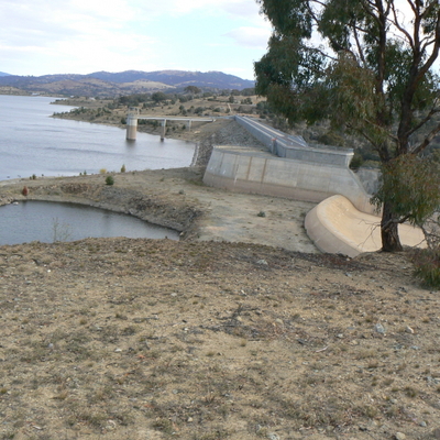 The eroded spillway and the dam wall