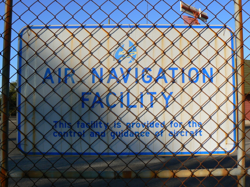 Sign on the fence of the Mount Majura Radar Complex.
This sign has the Airservices Australia logo on it.