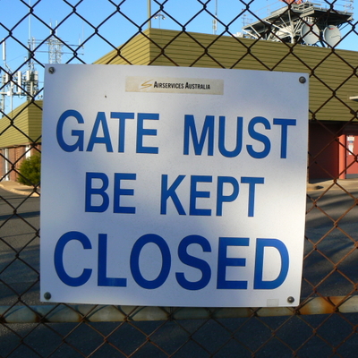 Sign on the fence of the Mount Majura Radar Complex.
The logo on this one is very faded, and only appears to contain the yello "S" symbol from the middle of the logo.